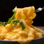 Creamy Baked Mac and Cheese is thick and creamy