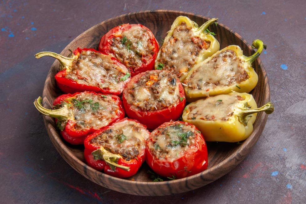 Chicken-&-Rice-Stuffed Peppers with Sun-Dried Tomato Cream Sauce